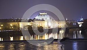 Embankment of the Vltava River near Charles Bridge, night. Prague. Czech Republic