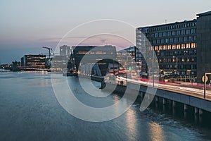 Embankment of water canal in Copenhagen at dusk