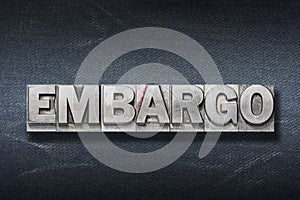 Embargo word den