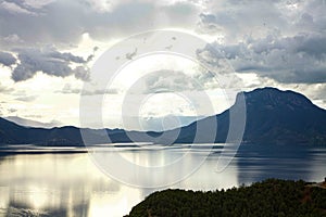 Lugu Lake Tranquility: China\'s Highlands, sunset. photo