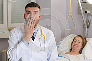 Embarrassed doctor making a mistake photo