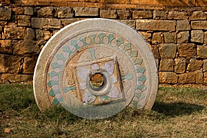 Embedded, Carved Stone Wheel