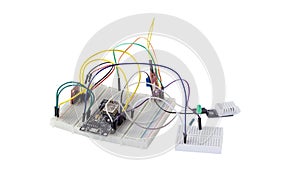 Embedded microelectronics components on prototyping board