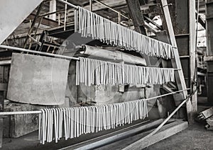 Embedded parts for concrete structures with reinforcement, iron plates, construction site, painted and suspended for drying