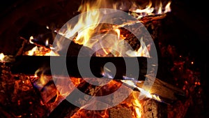 Embers glowing in blazing fire bonfire embers