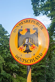 Emblem of Germany with sign Bundesrepublik Deutschland with eagle