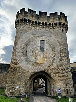 Emblematic view of the Lhyan Gate in the medieval town of Rions, Gironde, France