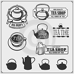Emblems of Tea shop and Tea point. Teapots and kettles set. photo