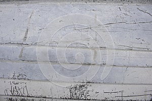 Embossed aluminum metal distressed surface with marks, nicks, and scratches