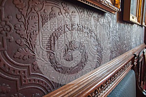 Embossed historic wallpaper