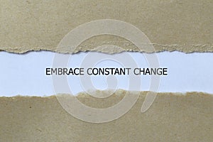 embrace constant change on white paper