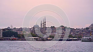 Embrace the grandeur of Istanbul's historic city center as seen from a ferry. A tapestry of history and modernity