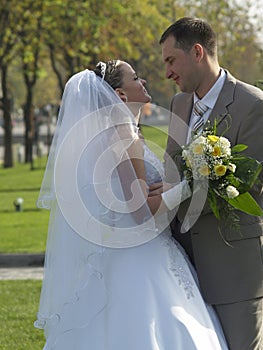 Embracing Just Married in Park