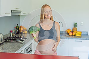 Embracing a nutrient-rich choice, a pregnant woman eagerly prepares to enjoy a wholesome serving of broccoli