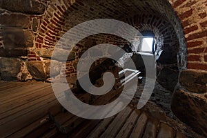 Embrasure and cannon on the fortress wall of the Solovetsky monastery