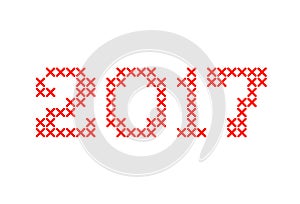 Embroided by cross stitch text 2017 new year isolated on white background.