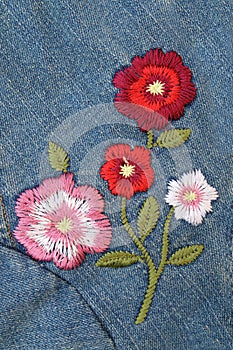 Embroider flower on jeans