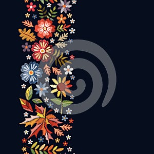 Embroidered design. Vertical seamless line with beautiful flowers and leaves in autumn colors. Template for cards