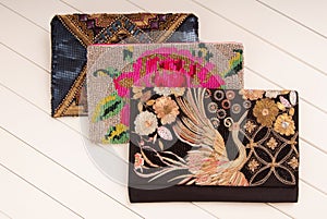 Embroidered handbags, three handbags with embroidery, clutches o