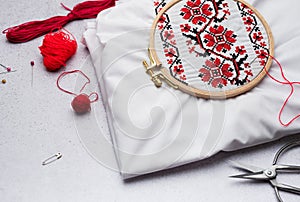 Embroidery with colored threads and various sewing accessories