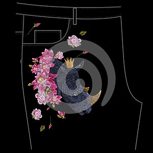 Embroidery colorful floral pattern with exotic rhinoceros for jeans.