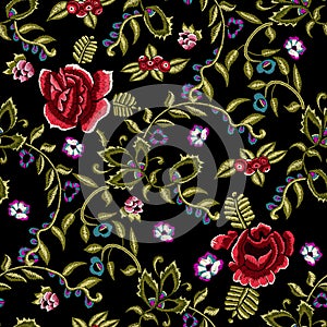 Embroidery ethnic seamless pattern with simplify red roses and rowanberry. photo