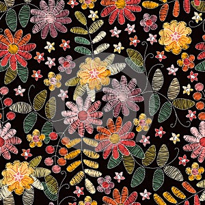 Embroidery floral seamless pattern with beautiful summer flowers on black background. Fashion design for fabric.