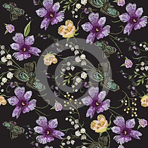 Embroidery floral seamless pattern with ethnic violets.