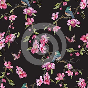 Embroidery floral seamless pattern with oriental cherry blossom photo