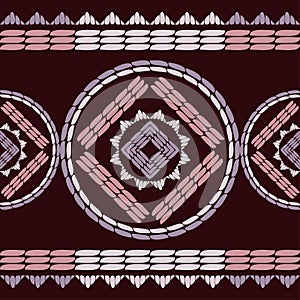 Embroidery. A mosaic of striped geometric figures. Seamless pattern. Design with manual hatching. Textile. Ethnic boho ornament.