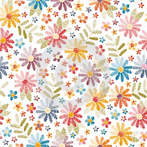 Embroidery seamless pattern. Beautiful flowers and leaves isolated on white background. Colorful fancywork. photo