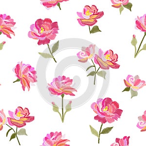 Embroidery seamless pattern with beautiful pink rose flowers isolated on white background. Summer print. Fashion design.