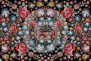 Embroidery seamless pattern with bright colorful flowers. Fashion design. Floral print for fabric
