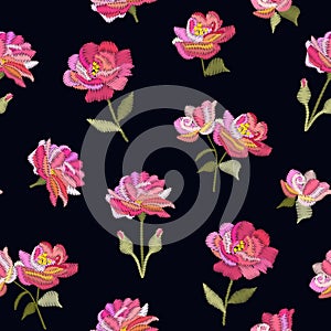 Embroidery seamless pattern with pink flowers on black background. Imitation of satin stitch. Vector illustration