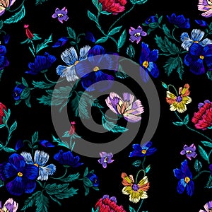 Embroidery seamless pattern with violet flowers. Vector embroidered floral design for fabric