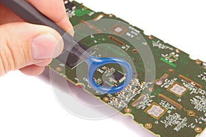 EMC engineer analyzing PCB using near-field probe