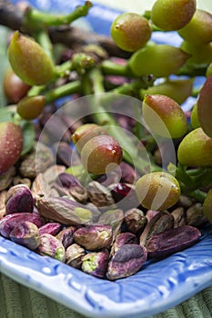 Emerald green pistachios nuts from town Bronte, located on slopes of Mt. Etna, Sicily, Italy regional product