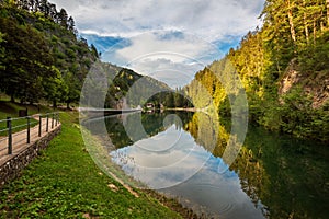 Emerald lake landscape, Non Valley, Italy photo