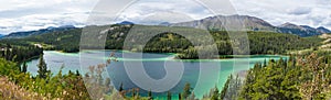 Emerald Lake under cloudy sky in Yukon Canada