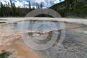 The Emerald Pool hot spring geyser in Black Sand Basin in Yellowstone National park