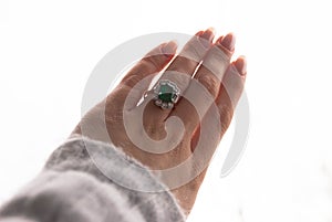 Emerald Ring, Antique jewelry, neat manicure, hand in the air