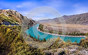 Emerald river in mountains