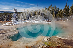 Emerald Spring at Norris Geyser Basin trail area, during winter in Yellowstone National Park, Wyoming