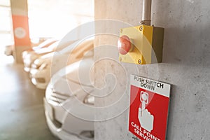 Emergency Alarm button at car park complex for security alert and crime control