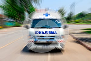 Emergency ambulance travels through city street, Zoom effect applied for dramatic effect, Ambulance first aid abstract motion blur