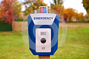 Emergency box in city park - police call button for help from criminals. Park security, order in city