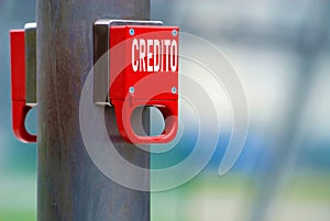 emergency brake with the spanish and italian word Credito for Credit photo
