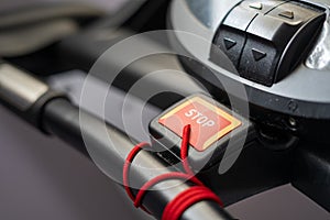 Emergency brake stop button on a treadmill at the gym to prevent accidents and injuries