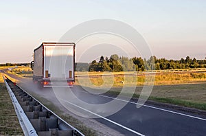 Emergency braking of a loaded truck on dry asphalt. Safety concept and stopping distance with ABS, copy space