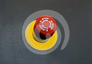 Emergency button on black background.